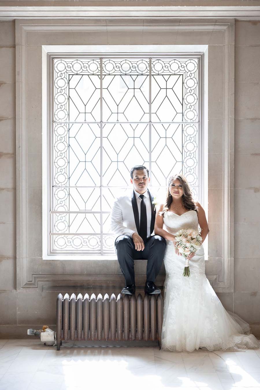 San Francisco City Hall wedding photo - inside, in front of window